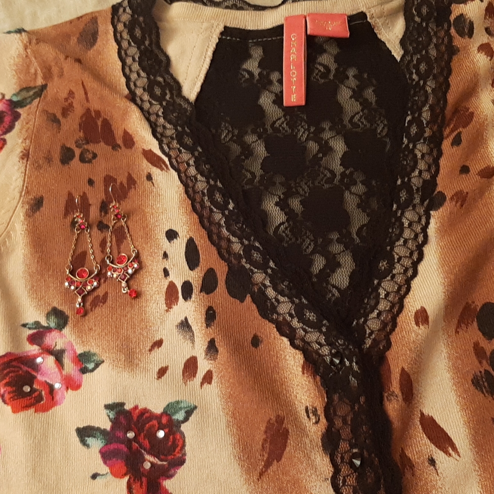 Light weight sweater...wear with jeans, black pencil skirt with your stilettos..